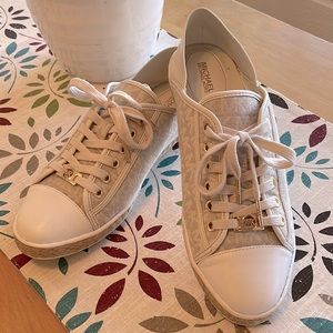 Great used condition! Cream and white MK sneakers.